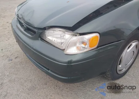 2000 Toyota Corolla Ce z USA, uszkodzony, nr VIN 2T1BR12E9YC340343